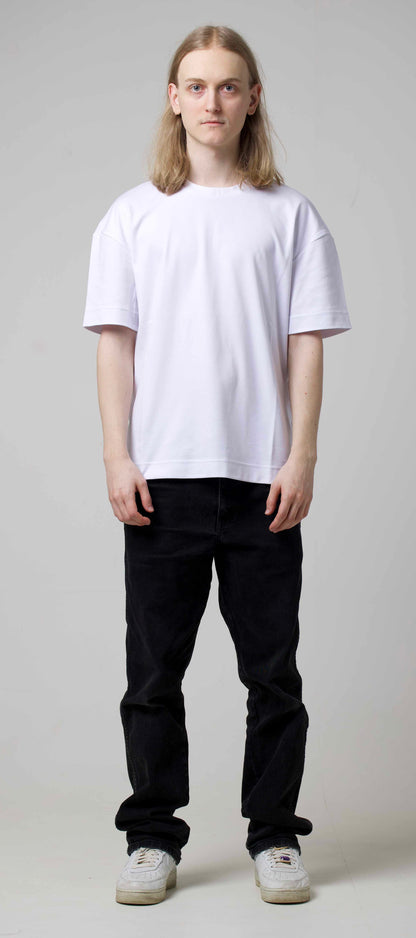 BBAP white oversized t-shirt full body front view on male model with black pants